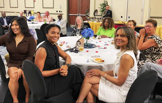 Pat and a few attendees at Jimmy Hopper event